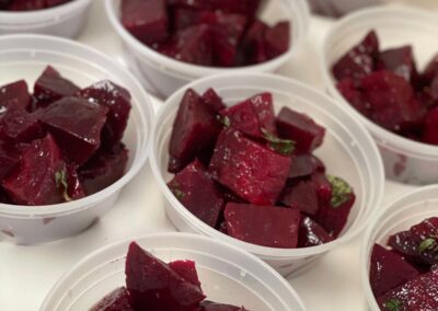 beets in plastic containers on a table during an Ethiopian flavors cooking class