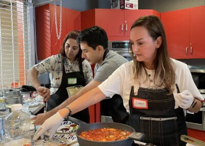 A group of people preparing Lebanese food in a Cooking Class