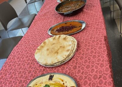 A long table with a lot of Lebanese Cooking Class with Jihan on it.