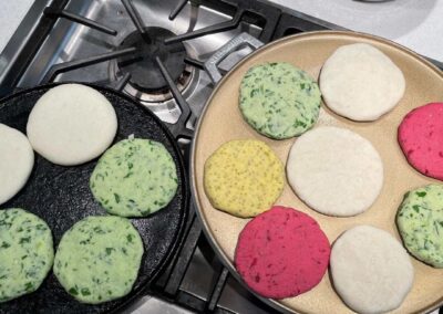 A pan with Venezuelan Cuisine on top of a stove.