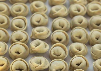 mini handmade dumplings served in a flavorful Sauce